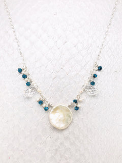Martinique Necklace- A Keshi Pearl pendant with mesmerizing Emerald Swarovski crystals and Freshwater Pearls on Sterling Silver adjustable chain. 