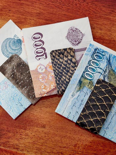 Exotic Fish Leather Money Clips designed and handcrafted in Cape Charles, VA.