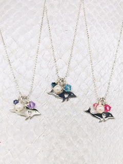 Nantucket Necklace-Sterling Silver Dolphin Charm adorned with Freshwater pearls and Swarovski Crystals suspended by Sterling Silver ball chain handcrafted by the Chesapeake bay in Cape charles, VA.