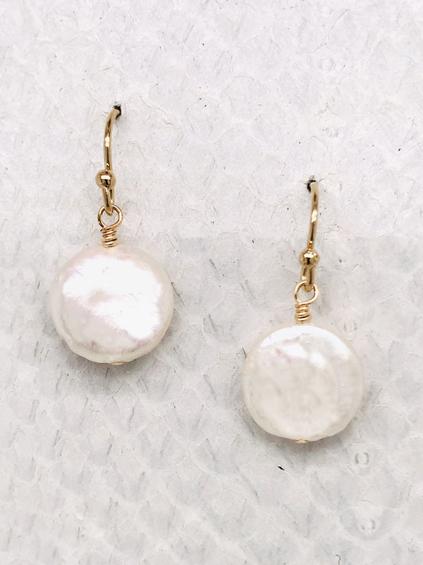 Ranier Earrings– 1/2" White Freshwater Coin Pearl suspended from 14K Gold-filled ear wires handcrafted in Cape Charles, VA.