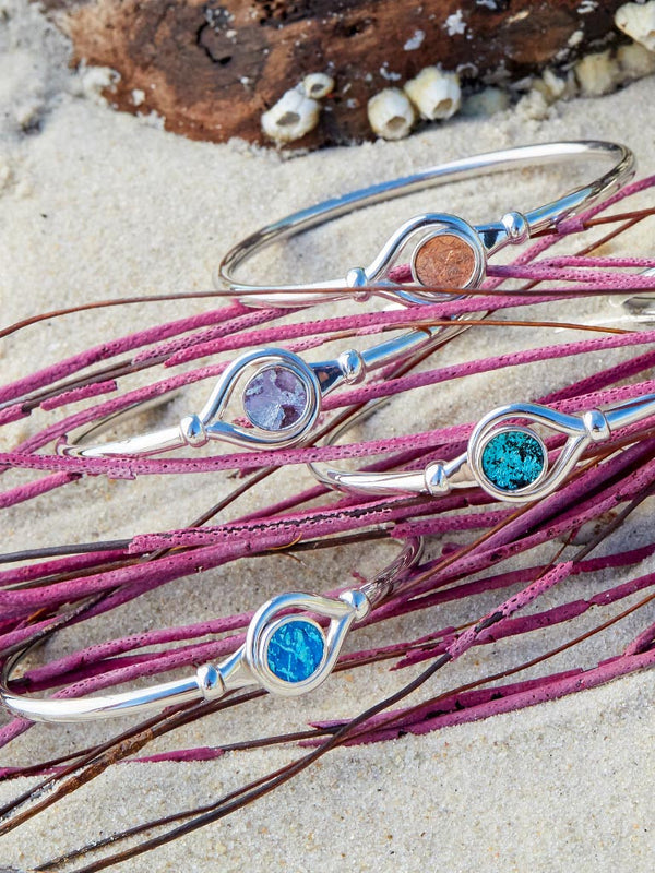 Samoa Bracelet– Sterling Silver bangle Bracelet inset with Genuine Metallic Icelandic Fish Leather handcrafted in Cape Charles, Va.