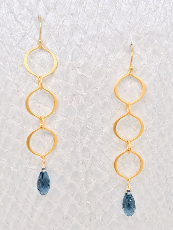 Victoria Earrings– Denim Blue Swarovski Crystals suspended by Vermeil-Style organic shaped petal links handmade in Cape Charles, VA.
