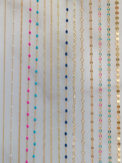 A selection of gold-filled permanent jewelry chain styles